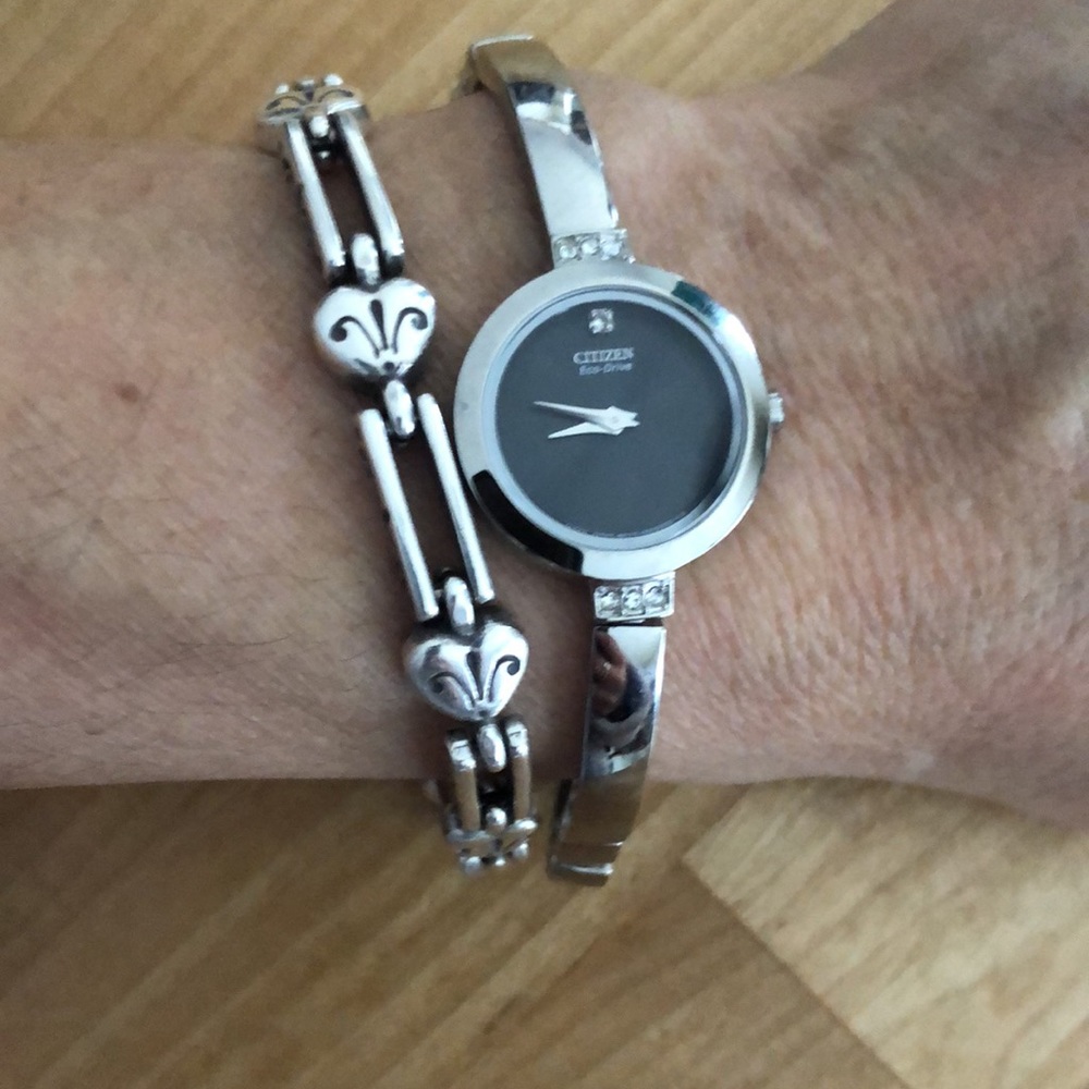 Women’s Eco drive Citizen bangle watch. Never needs a battery!